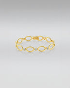 Twisted Oval Link Bracelet in 18K Yellow Gold with Lab-Grown Diamonds