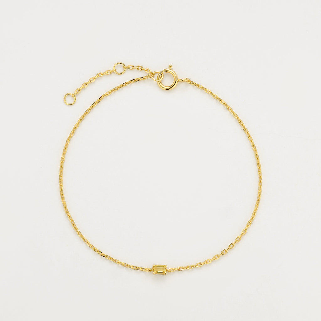 Filigranes Armband aus 18K Gelbgold mit gelbem Diamanten im Smaragdschliff.