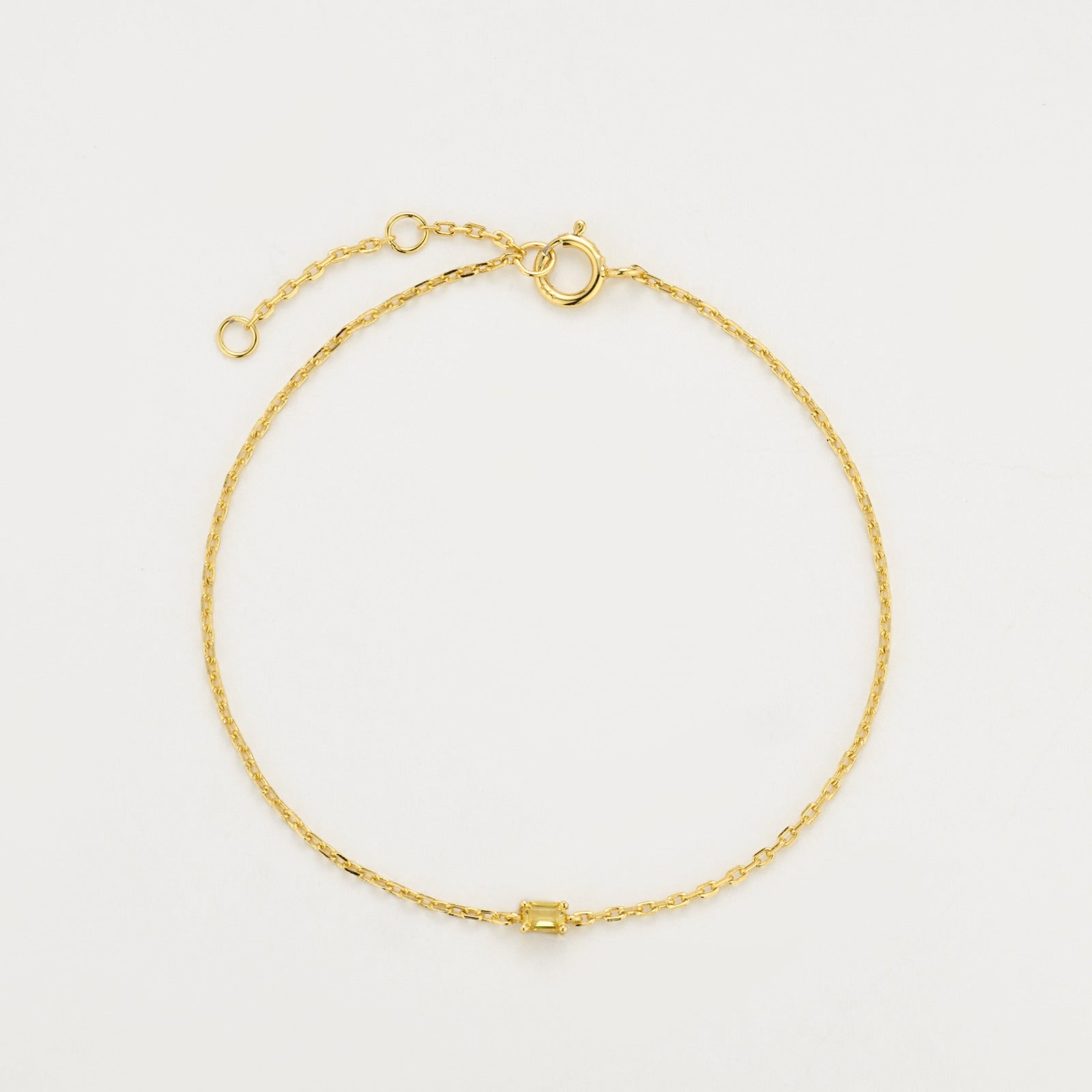 Filigranes Armband aus 18K Gelbgold mit gelbem Diamanten im Smaragdschliff.