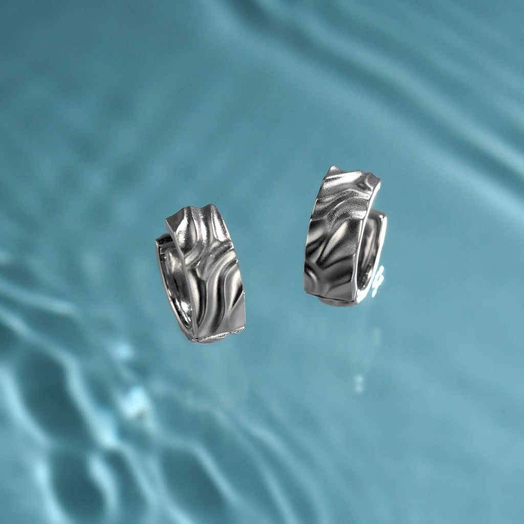 Sternvoll® Damen Creolen aus 925 Sterling Silber Rhodium Platziert | Premium Ohrringe in gehämmerter Optik - Sternvoll Jewelry color-silver